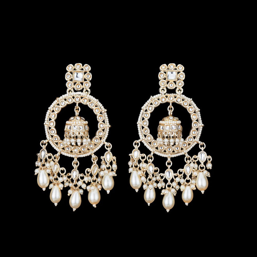 Kundan, Pearl Jhumka earrings.