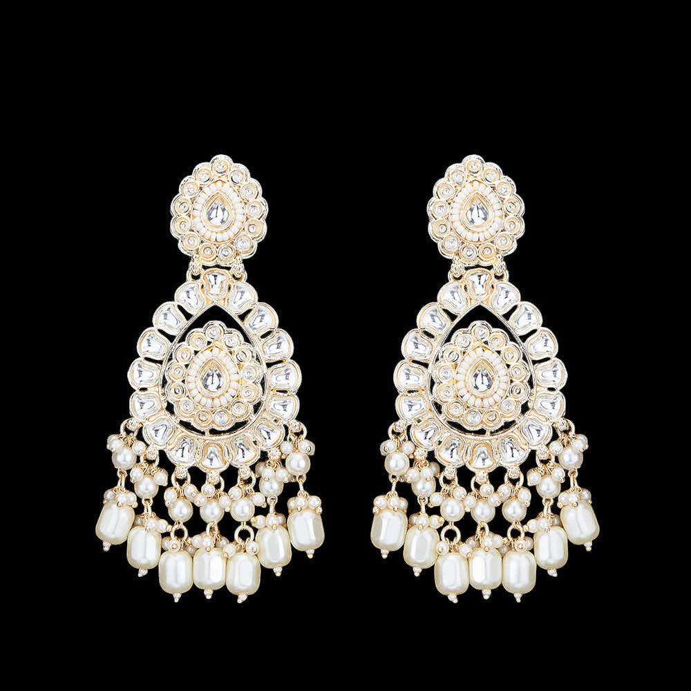 Kundan, Pearl Jhumka earrings.