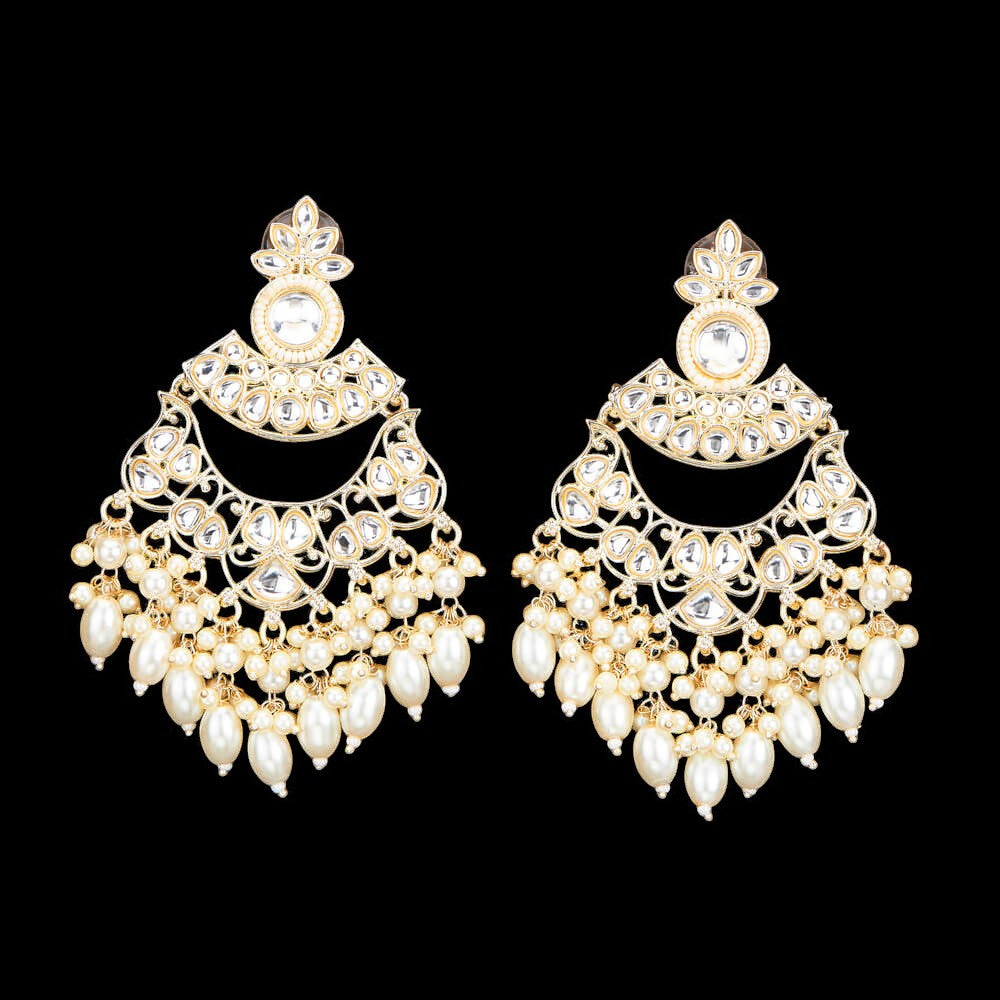Kundan, Pearl Jhumka earrings.