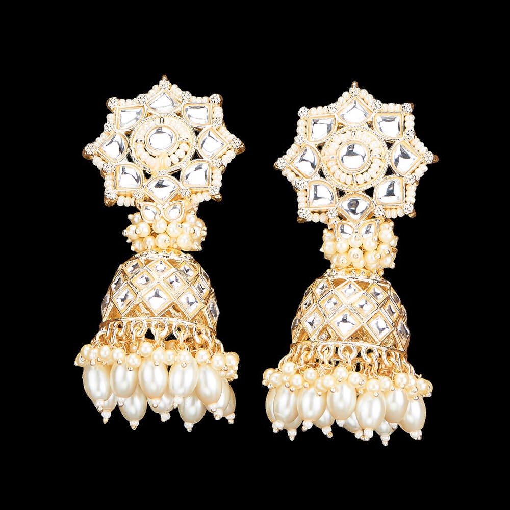 Kundan, Pearl Jhumka earrings.