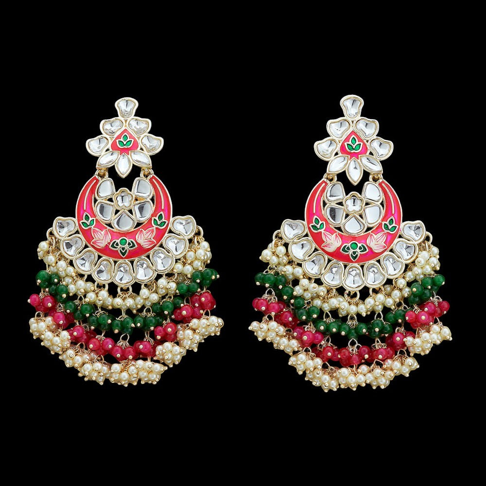 Kundan, Pearl Jhumka earrings.