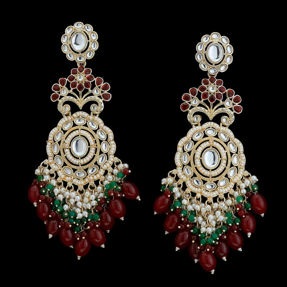 Kundan, Pearl Jhumka earrings.