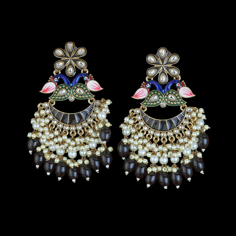 Kundan, Pearl Jhumka earrings.