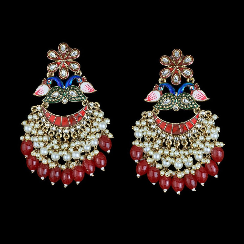 Kundan, Pearl Jhumka earrings.