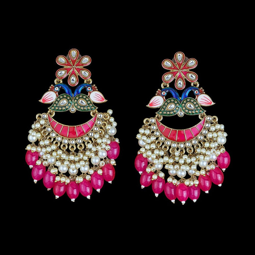 Kundan, Pearl Jhumka earrings.