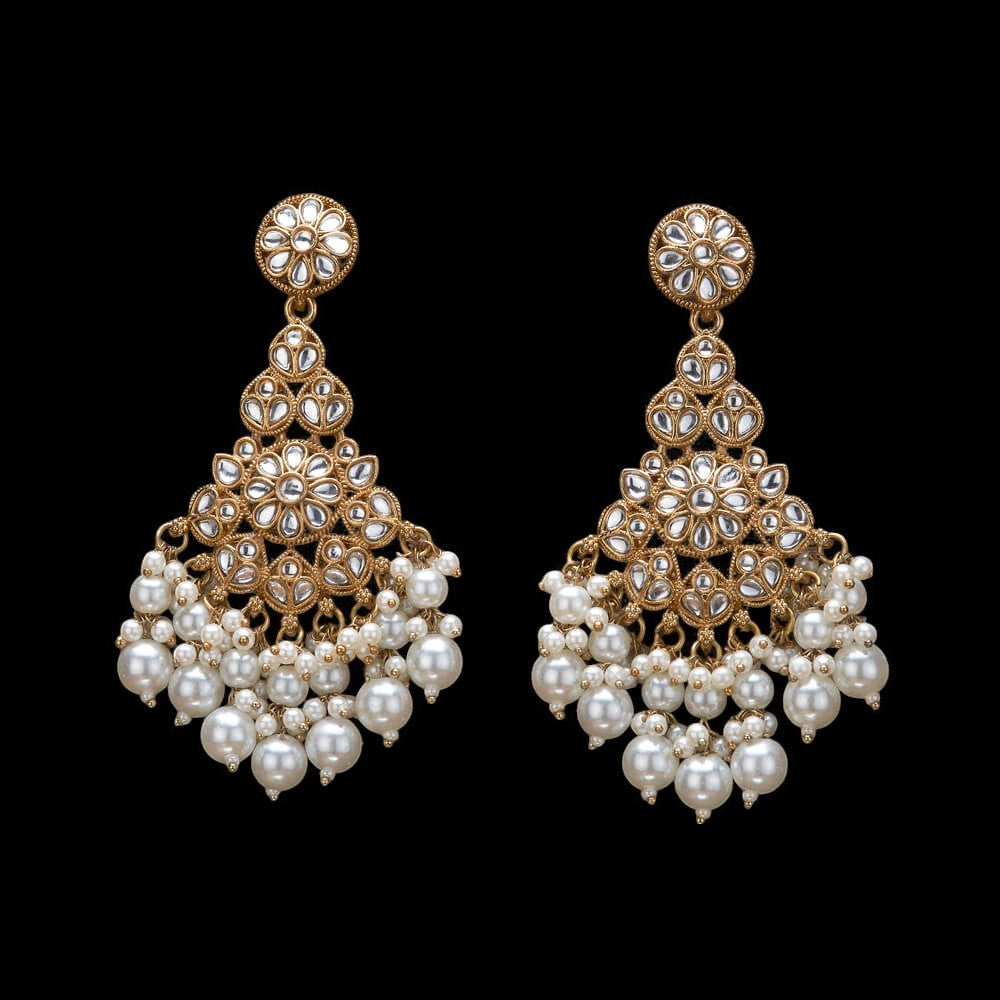 Kundan, Pearl Jhumka earrings.