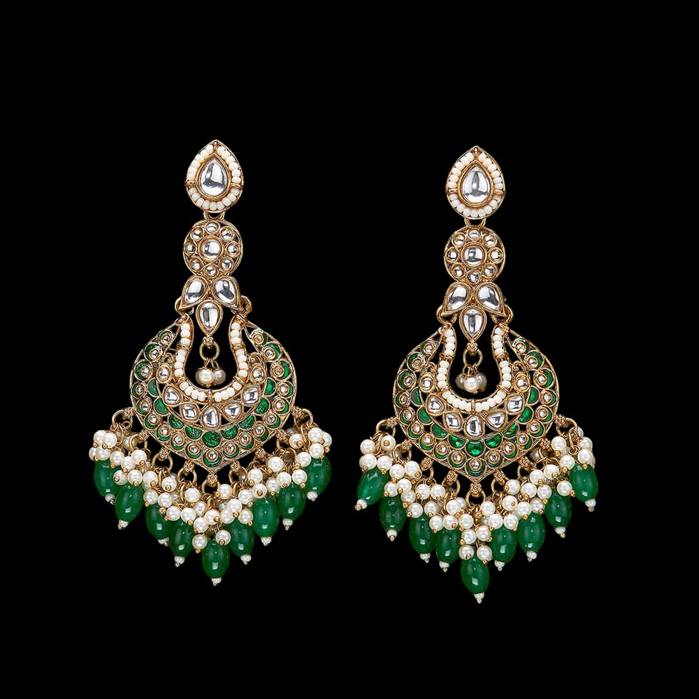 Kundan, Pearl Jhumka earrings.