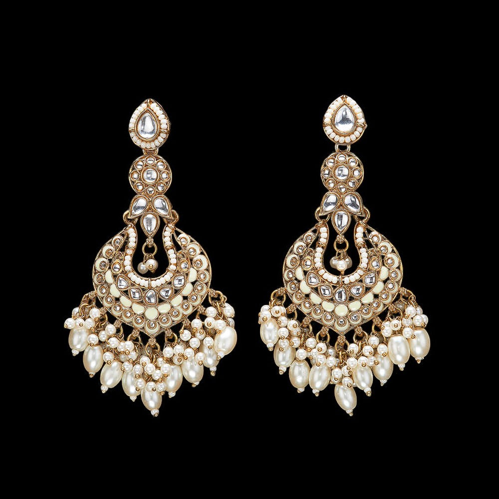 Kundan, Pearl Jhumka earrings.