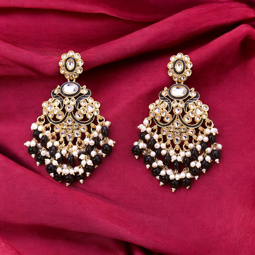 Kundan, Pearl Jhumka earrings.