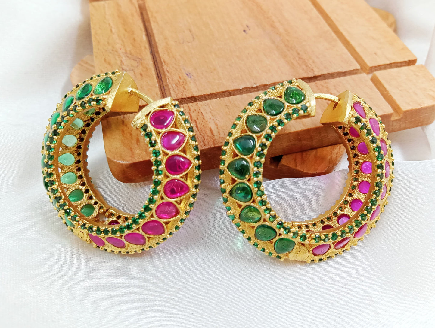 Ruby green studded golden hoop earrings