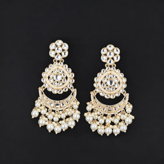Kundan, Pearl Jhumka earrings.