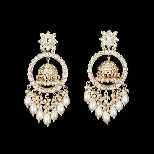 Kundan, Pearl Jhumka earrings.