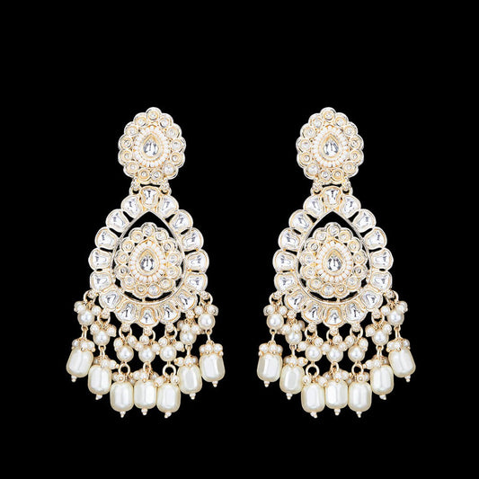 Kundan, Pearl Jhumka earrings.
