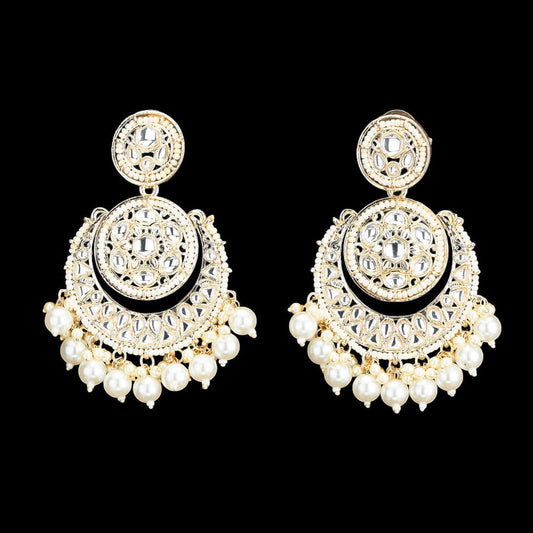 Kundan, Pearl Jhumka earrings.