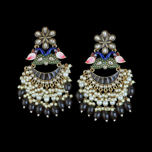 Kundan, Pearl Jhumka earrings.